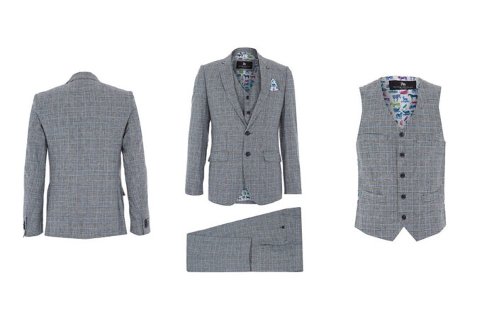 fashion photography mans suit in grey with blue stripes designer clothing